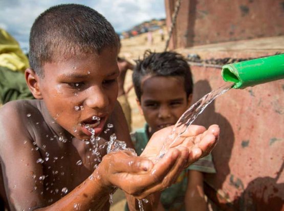 kids group learning arts and crafts in day care centre